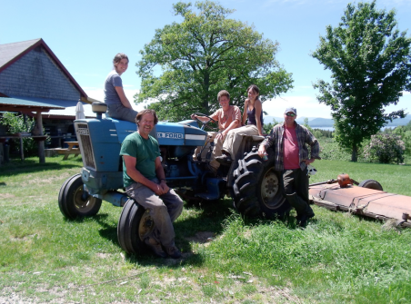 people sitting on a tractor