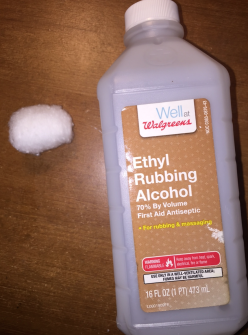 rubbing alcohol and cotton ball