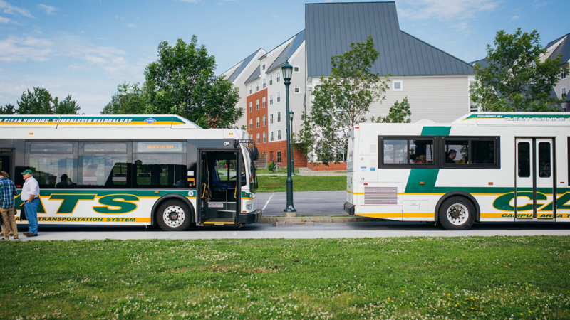 campus shuttles parked