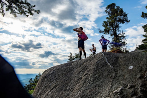 students on camels hump looking out at the view