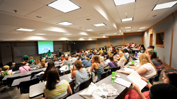 Students sit in a classroom in Kalkin Hall at UVM.