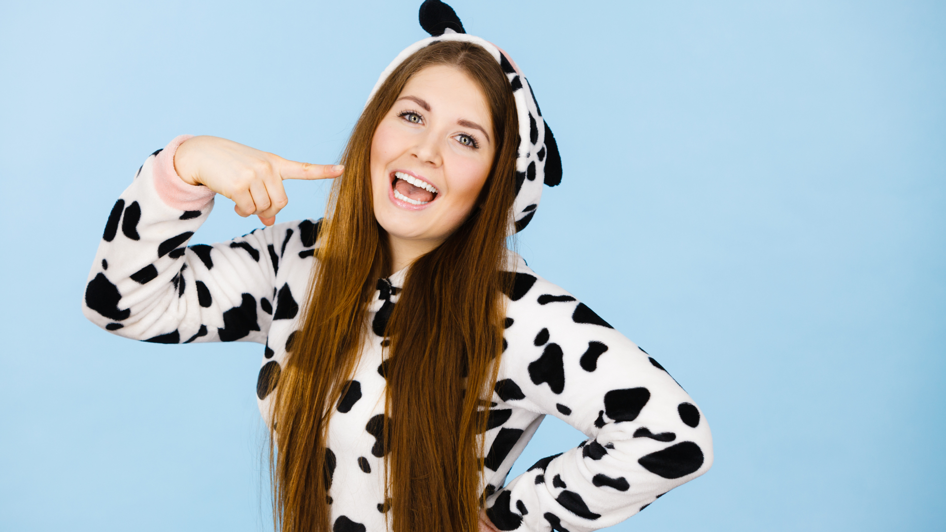 Person wearing a cow costume