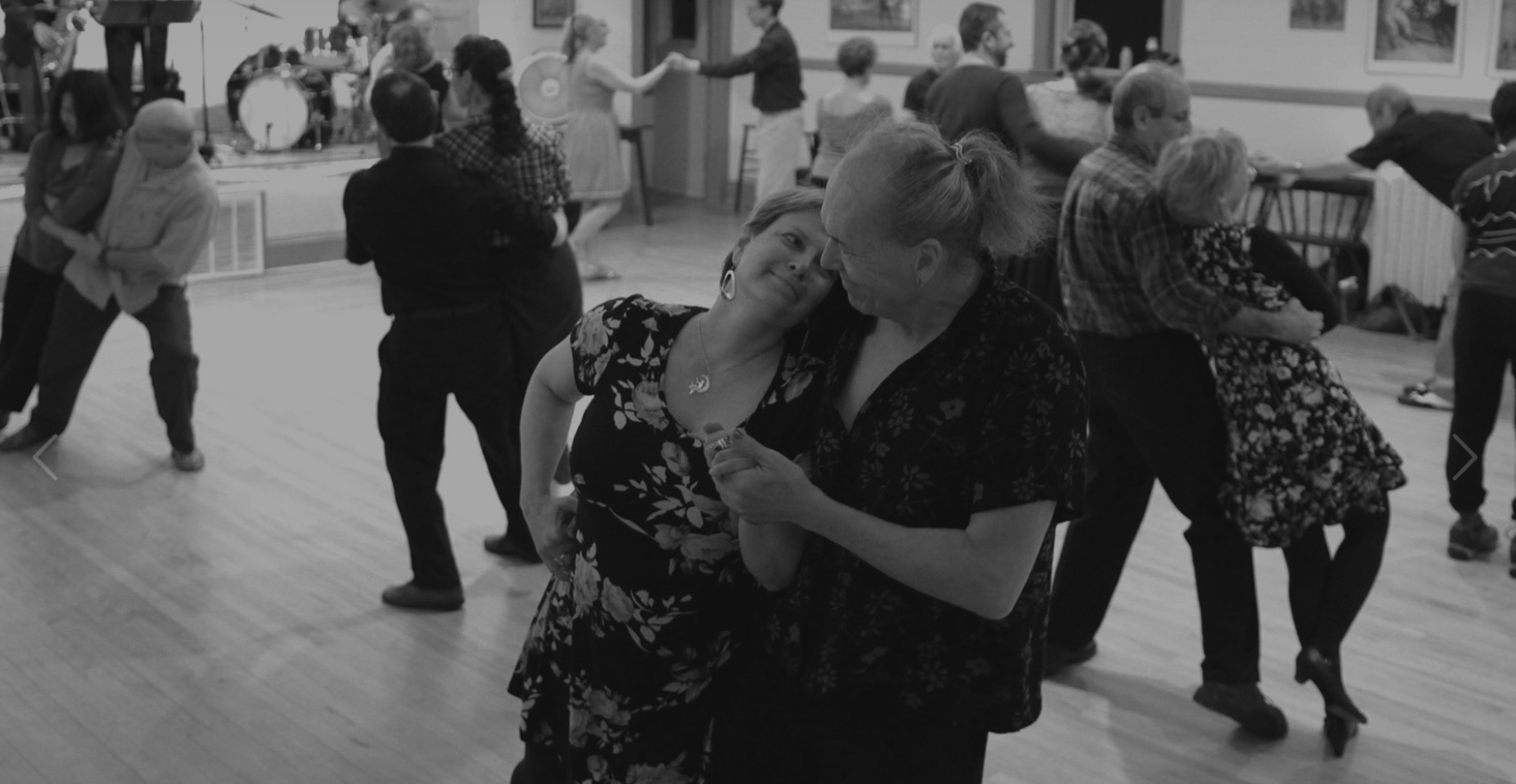 two people dancing together