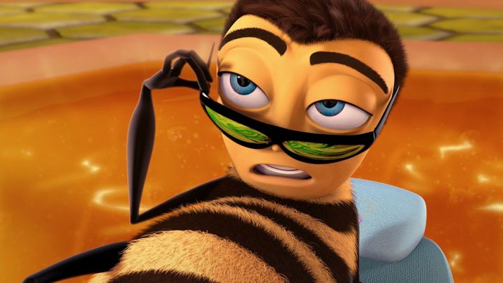 A cartoon bee floats on a pool of honey, styled to look like he's on a raft in a swimming pool. He is making an inquisitive face.
