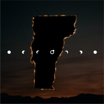 a blacked out outline of the state of Vermont with a gold border